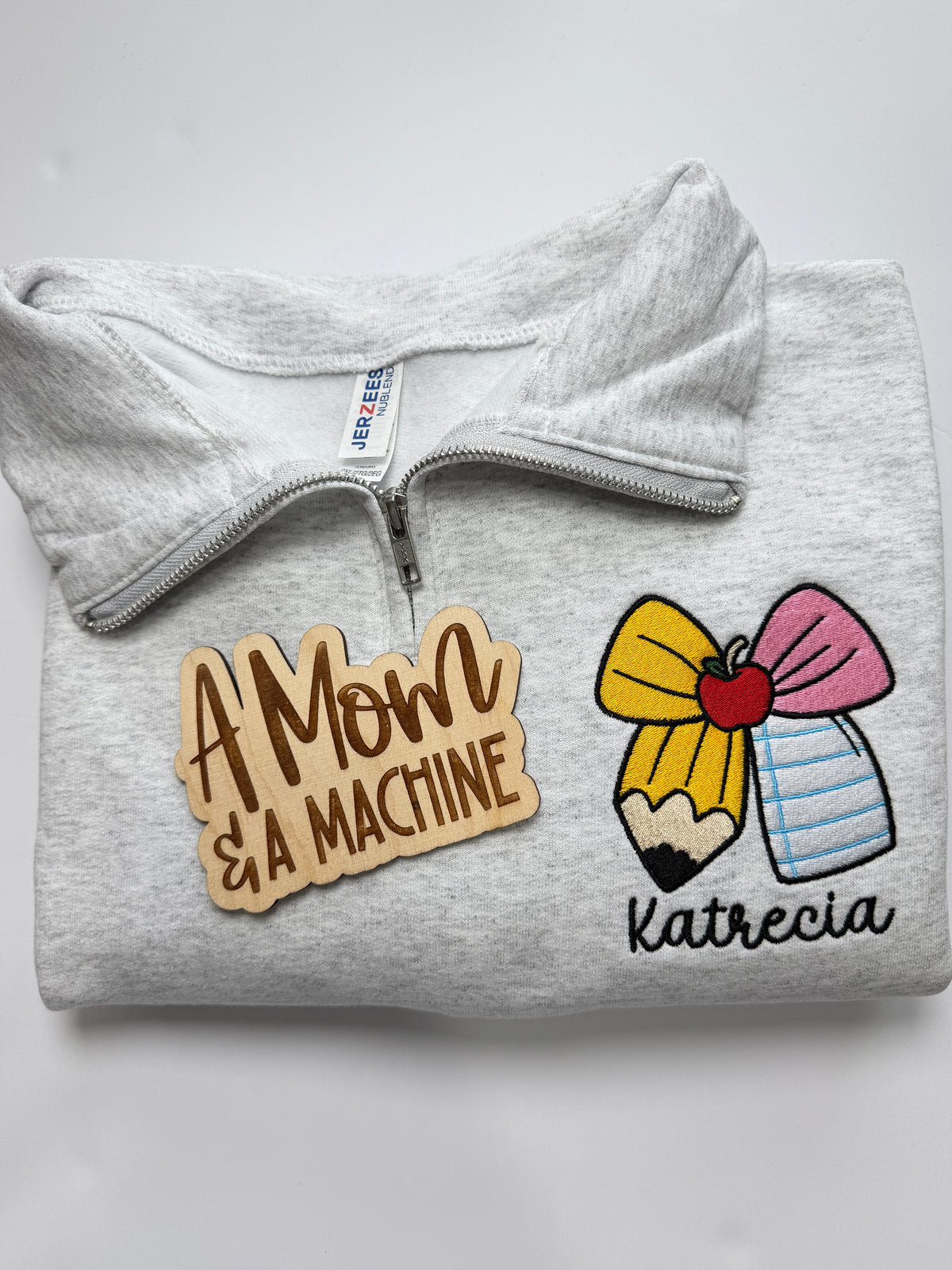 Pencil Bow Quarter Zip